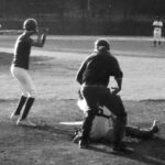 grainy black and white photo of pitcher throwing to batter in black and white at Lamar Porter field in Little Rock, Arkansas