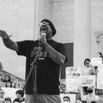 black and white photo of man speaking at rally for reproductive rights at State Capitol in Little Rock Arkansas