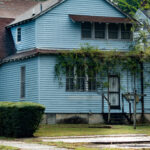 Color photograph of blue house in Dunbar historic neighborhood in Little Rock, Arkansas?